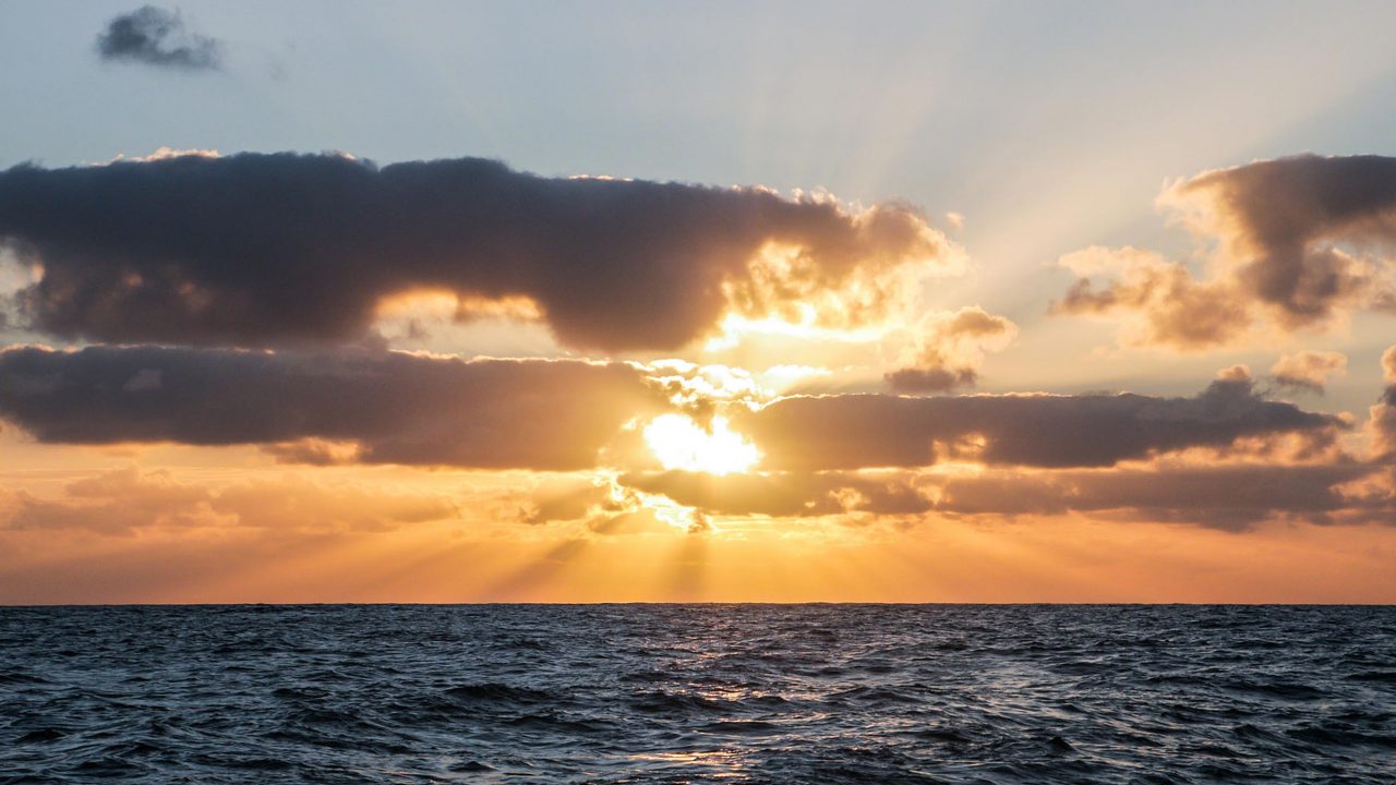 Photo of the sea with sunset
